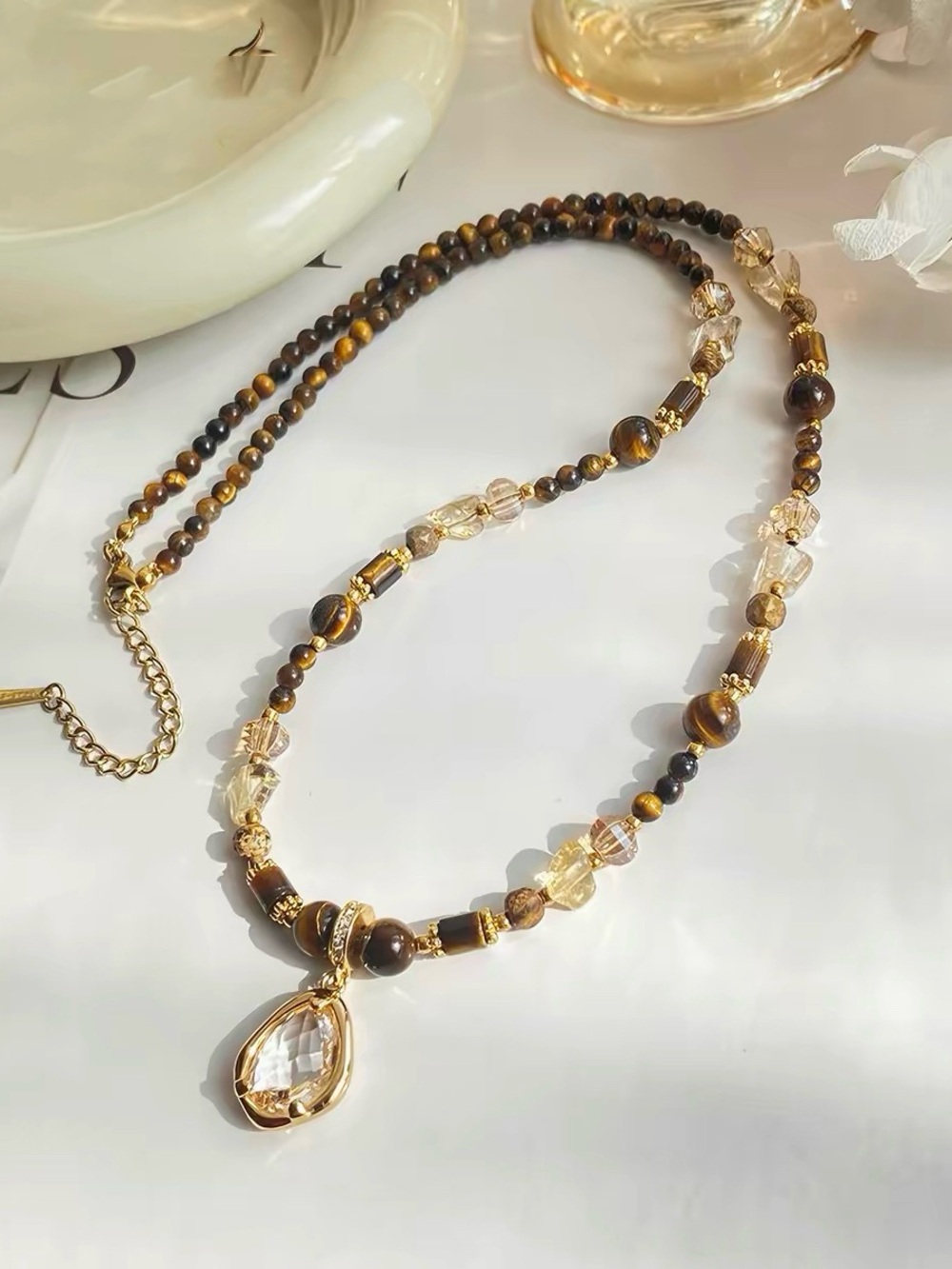 Gold-Tone Brown Beaded Necklace with Crystal Pendant